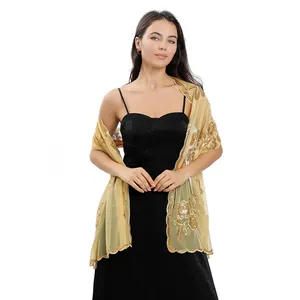 Detailed view of an elegant gold sheer shawl featuring intricate sequin peony embroidery