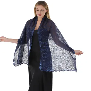 Detail of navy blue lace shawl with floral sequin embroidery for evening dresses