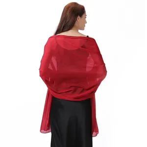 Detail view of elegant red glitter evening shawl wrap for formal party wedding dresses