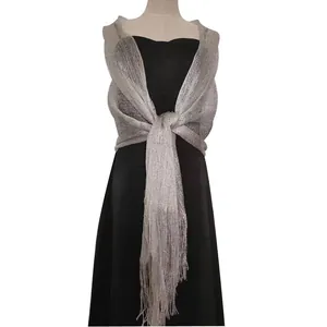 Detailed view showing the fine texture and shimmer of a silver metallic shawl wrap