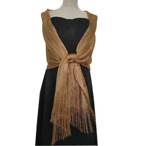Elegant gold metallic shawl with fringe detail for evening dresses and weddings