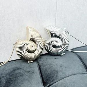 Set of gold and silver shell-shaped acrylic mini crossbody bags with sleek metal chains