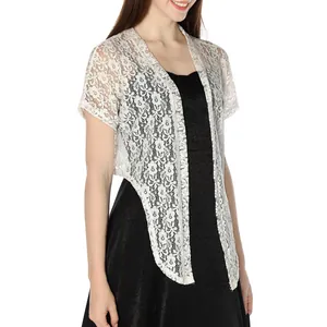 Close-up of elegant white floral lace cardigan shrug with short sleeves for women.