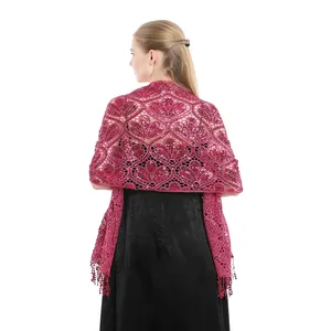 Elegant rose red sequin shawl with tassel detail shown on a model wearing a black dress