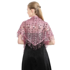 Detailed back view of pink sequin tassel shawl over black dress.