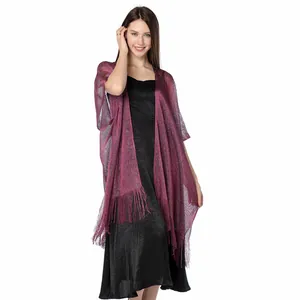 Detailed look at purple metallic silk shawl with fringe on a formal evening dress