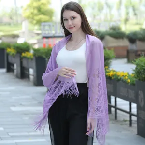 Elegant lavender purple lace shawl featuring floral embroidery and tassel fringe