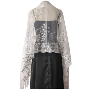 Detailed view of elegant white peacock embroidery shawl with silver sequins and fringes
