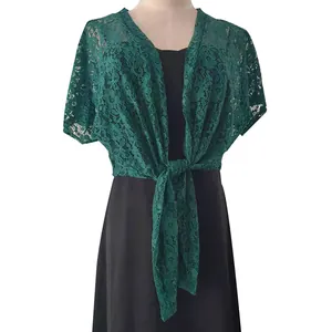 Detail view of a green lace tie-front shrug bolero for formal dresses and gowns