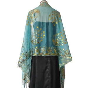 Back view of teal mesh shawl with gold peacock embroidery and sequins