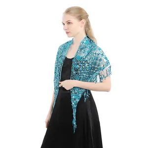 Detailed macro view of turquoise sequined lace shawl with delicate fringe trim
