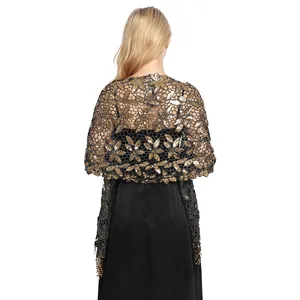 Back view of a luxurious sequined evening shawl with elegant gold tassel fringe detailing