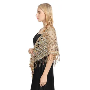 Side view of an elegant gold sequined triangle shawl with delicate fringe details.