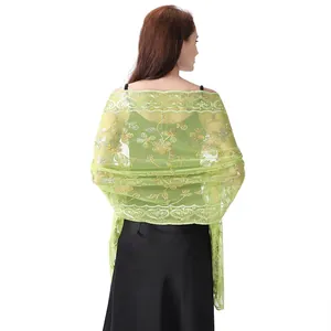 Detailed back view of lime green evening shawl with golden floral sequin embroidery
