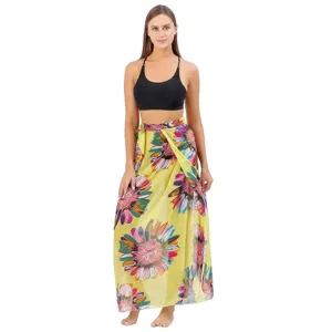 Detailed view of vibrant floral print beach wrap skirt sarong with adjustable side tie closure