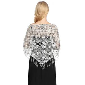 Detailed back view of an elegant silver sequin lace shawl with shimmering tassel fringe