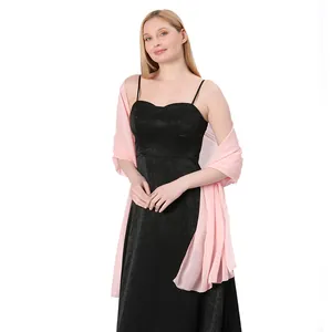 Elegant light pink chiffon long shawl scarf paired with a black formal evening dress
