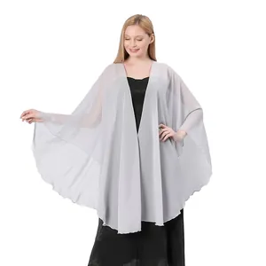 Elegant light grey sheer chiffon shawl cape draped beautifully over a black evening gown