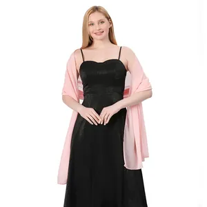 Elegant light pink chiffon shawl for bridesmaids, worn with a black evening dress on white