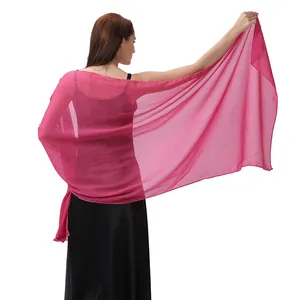 Detailed back view of a shimmering bright pink evening shawl draped over a formal black dress