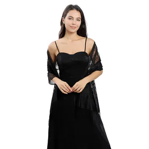 Detailed view of an elegant black floral lace shawl with fringes for evening banquet dresses