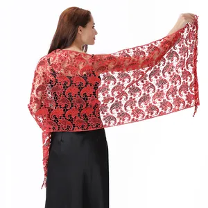 Detailed view of an elegant red sequined shawl with paisley pattern for evening dress