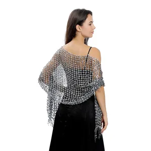 Back view detail showing sparkling silver sequin mesh shawl over an elegant black dress