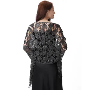 Detailed back view of an elegant grey sequined paisley lace shawl for formal occasions