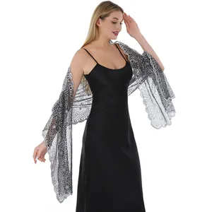 Detailed view of an elegant silver sequin embroidered lace shawl for evening dresses