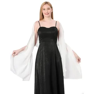 Elegant long white chiffon shawl draped over a formal black sleeveless evening dress