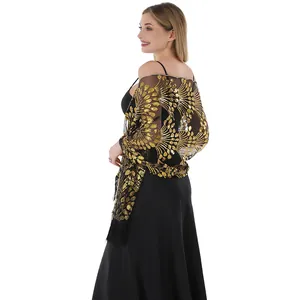 Side view of elegant black mesh shawl with gold sequin peacock embroidery and tassels