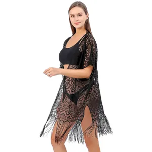 Elegante zwarte kant strand cover-up met geometrische patronen en franje details
