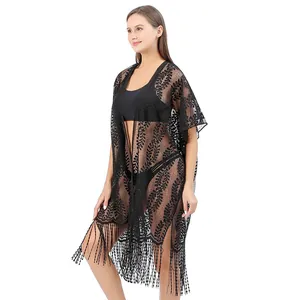 Elegante zwarte kant bikini cover-up met franjes voor zonbescherming op het strand vakantie