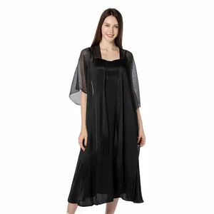 Detailed shot of black metallic thread shawl wrap featuring elegant shimmering texture