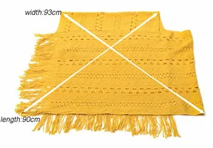 Close-up detail of yellow knitted fringe shawl showing dimensions of 93cm width and 90cm length