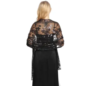 Detailed back view of an elegant black lace shawl with sparkling sequins for evening gowns