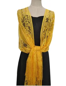 Elegant yellow hollow lace shawl with floral pattern and fringe detail for evening dresses.