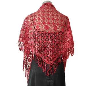 Back view detail of a red sequin lace shawl with elegant tassel fringe for evening parties