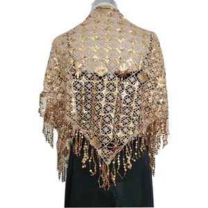 Detailed view of gold sequin tassel triangular shawl with intricate lace for evening