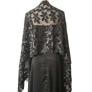 Elegant black lace shawl with sparkling sequins and fringe detail for evening party wrap