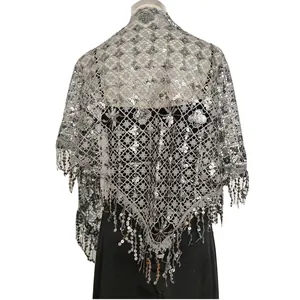 Back view detail of elegant silver sequin lace shawl with tassel trim for evening parties