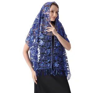 Detail view showing the intricate blue water-soluble sequined paisley lace texture