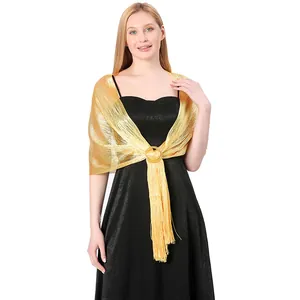 Model wearing a gold metallic shawl with buckle for wedding and evening party dresses