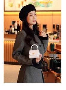 Mini white pearl jelly handbag lifestyle detail shot featuring an elegant asian model