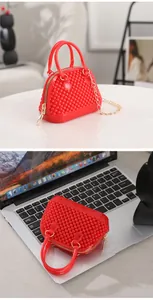 Detailed product photos showcasing a mini red jelly shell bag with chain strap
