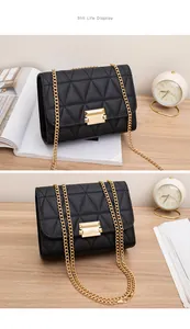 Black triangular quilted crossbody bag with elegant gold chain and lock detail