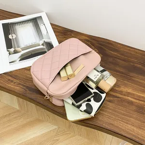 Stylish pink quilted crossbody bag for women with minimalist rectangular design