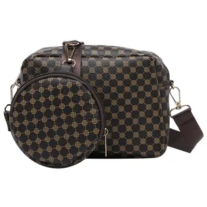 Vintage braune Umhängetasche mit Kleemuster und passender runder Münztasche