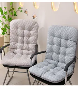 Close-up view of integrated grey and blue seat cushions displayed on chairs in a home setting