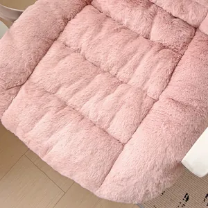 Macro view of soft pink fluffy texture on heated office chair seat cushion